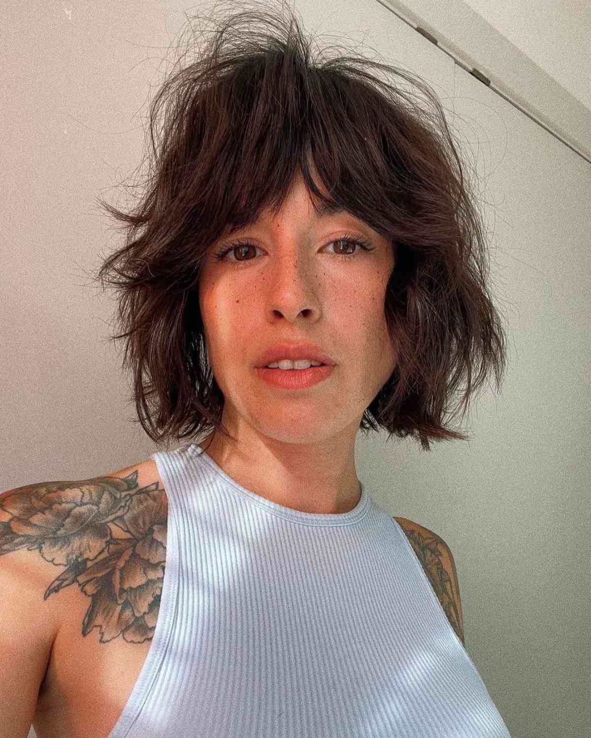 Bold Bottleneck Fringe on a Tousled Bob