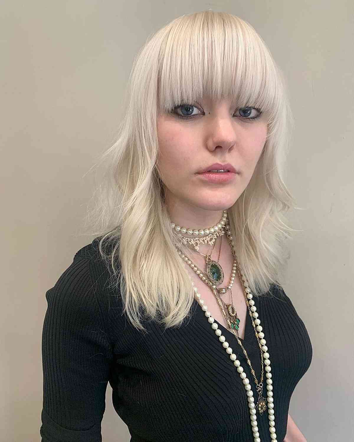 Bold Thick Bangs for Thinning Hair