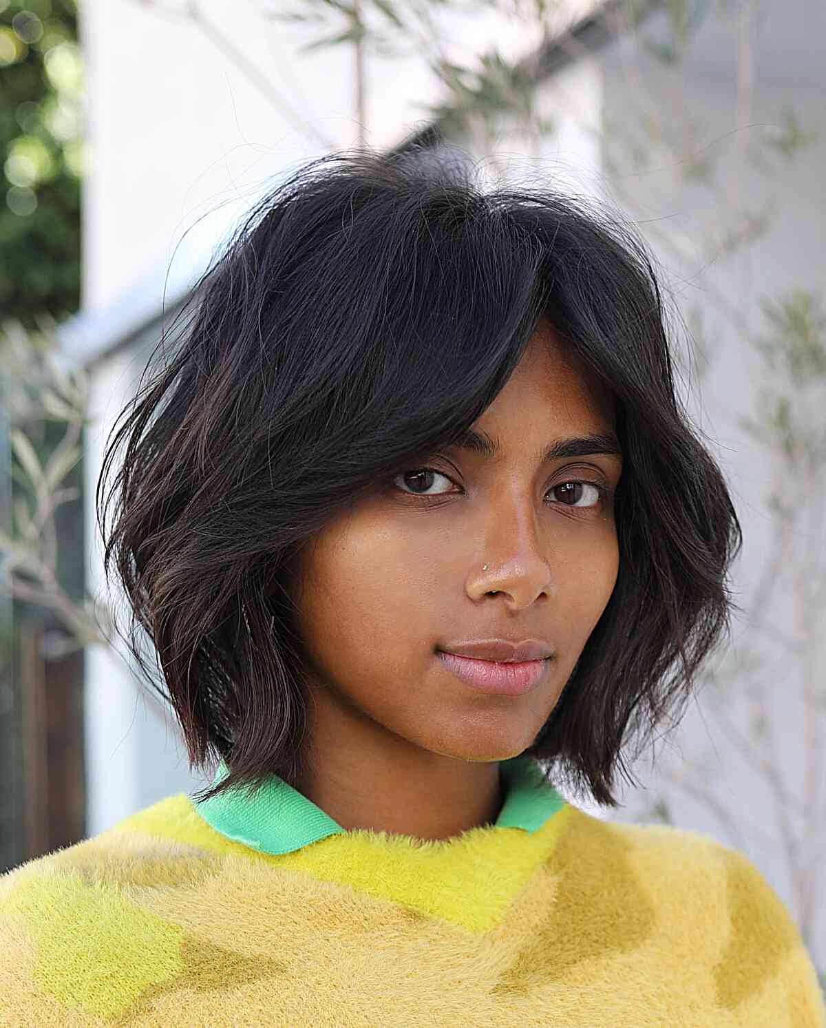 Bottleneck Bangs on a Shoulder-Length Cut with layers and lived-in texture