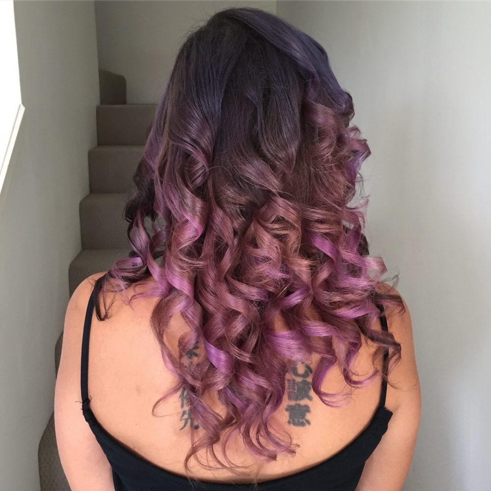 Bouncy & Playful Curls with Purple Highlights