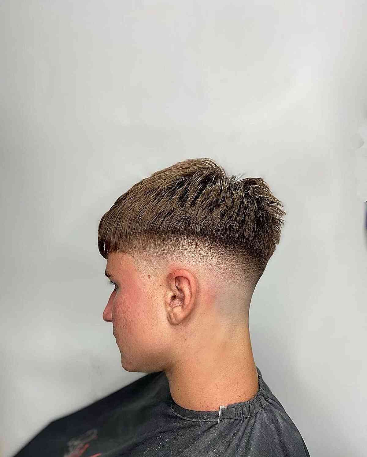 British-Inspired Fade with Short Sides for Men with Thick Hair