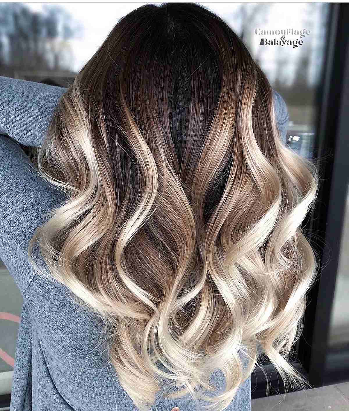 Dark Brown to Blonde Ombre Balayage with Luscious Waves