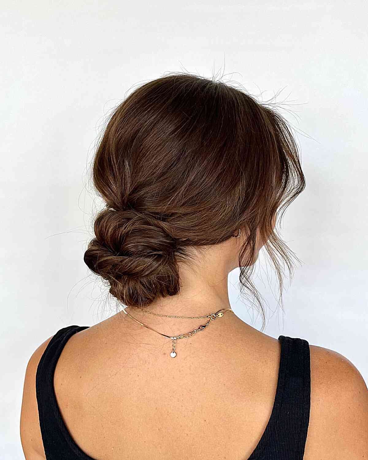 Elegant Brunette Bun That Frames the Face