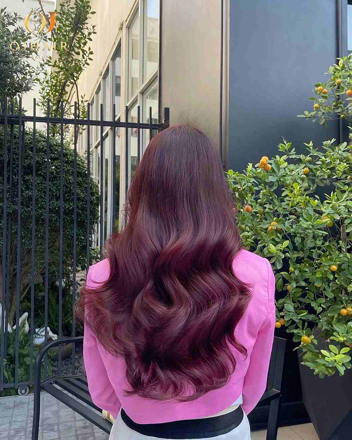 Burgundy Long Locks with Delicate Layers and Bouncy Waves