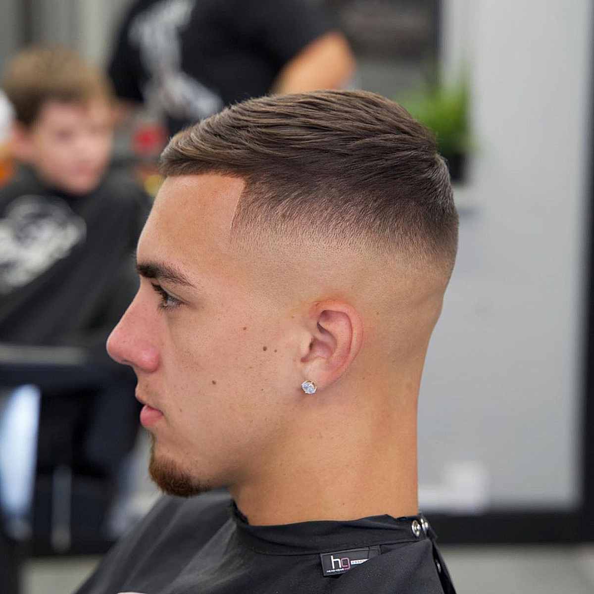 Tapered Caesar Style with Mid Bald Fade