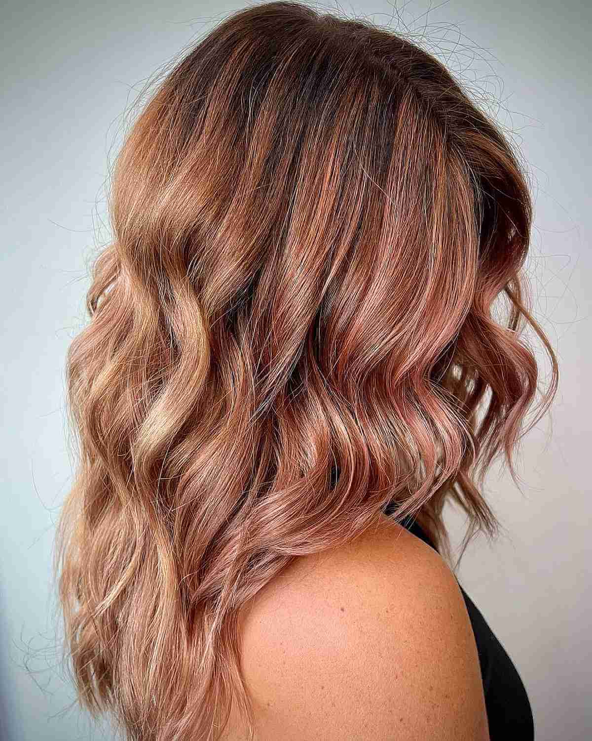 Caramel Accents on Rose Gold Balayage Hair