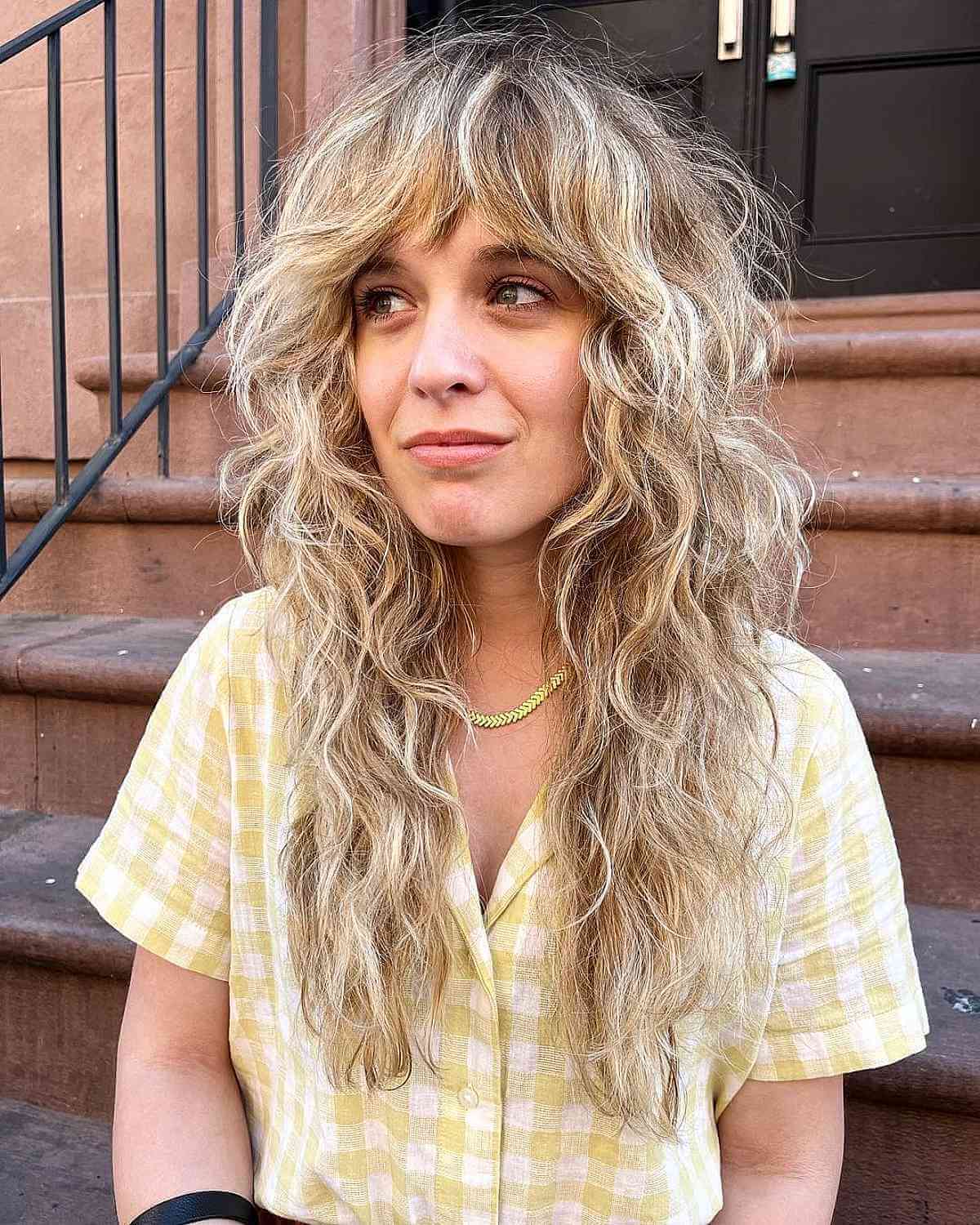 Long Casual Shag Cut Featuring Textured Layers on Curly Hair
