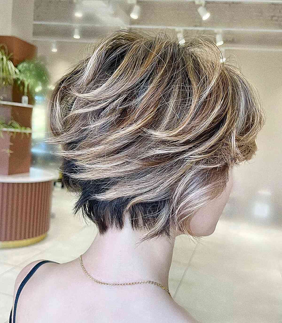Charming Blonde Balayage with Dark Hair Beneath