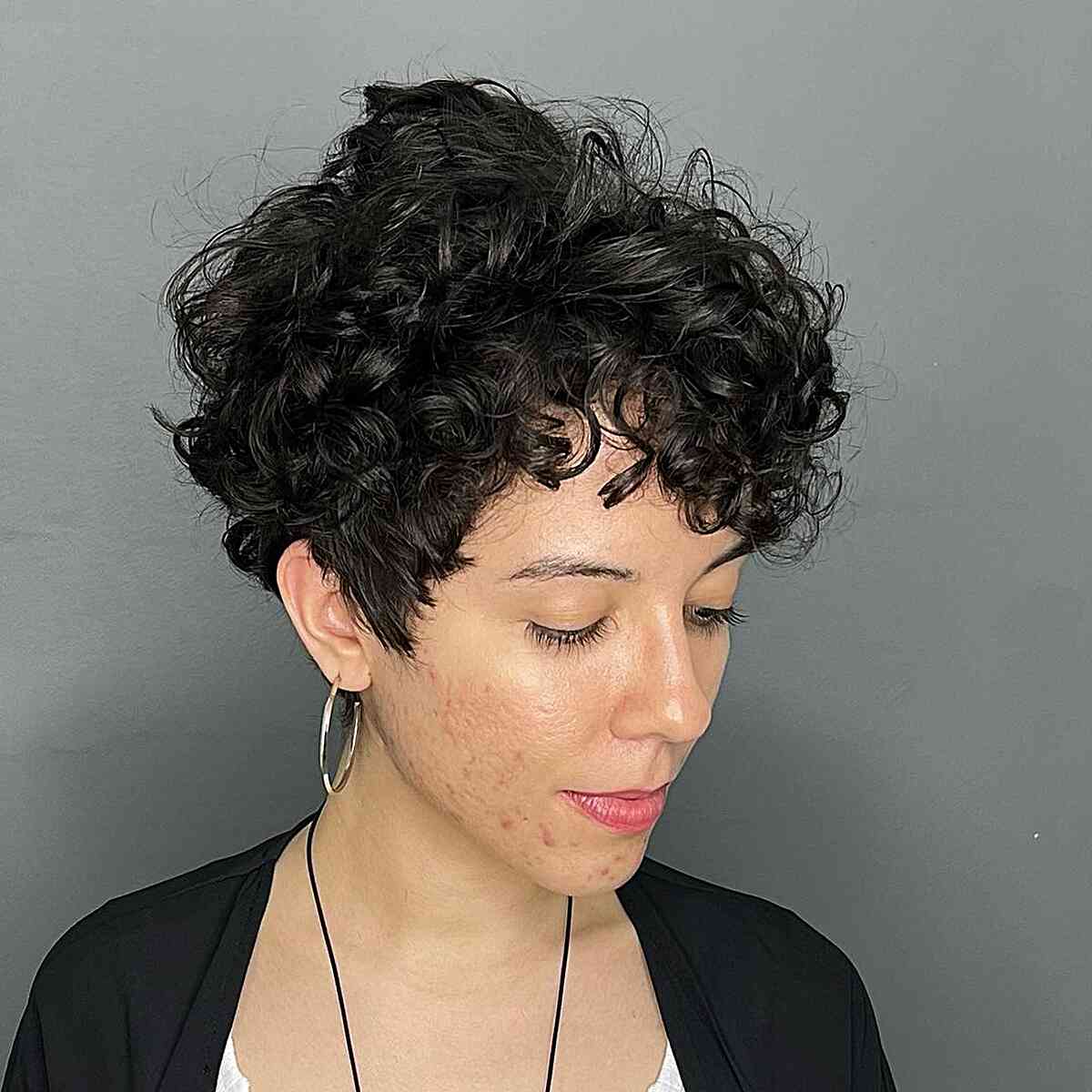 Charming Curly Pixie Hairstyle for Thick Hair