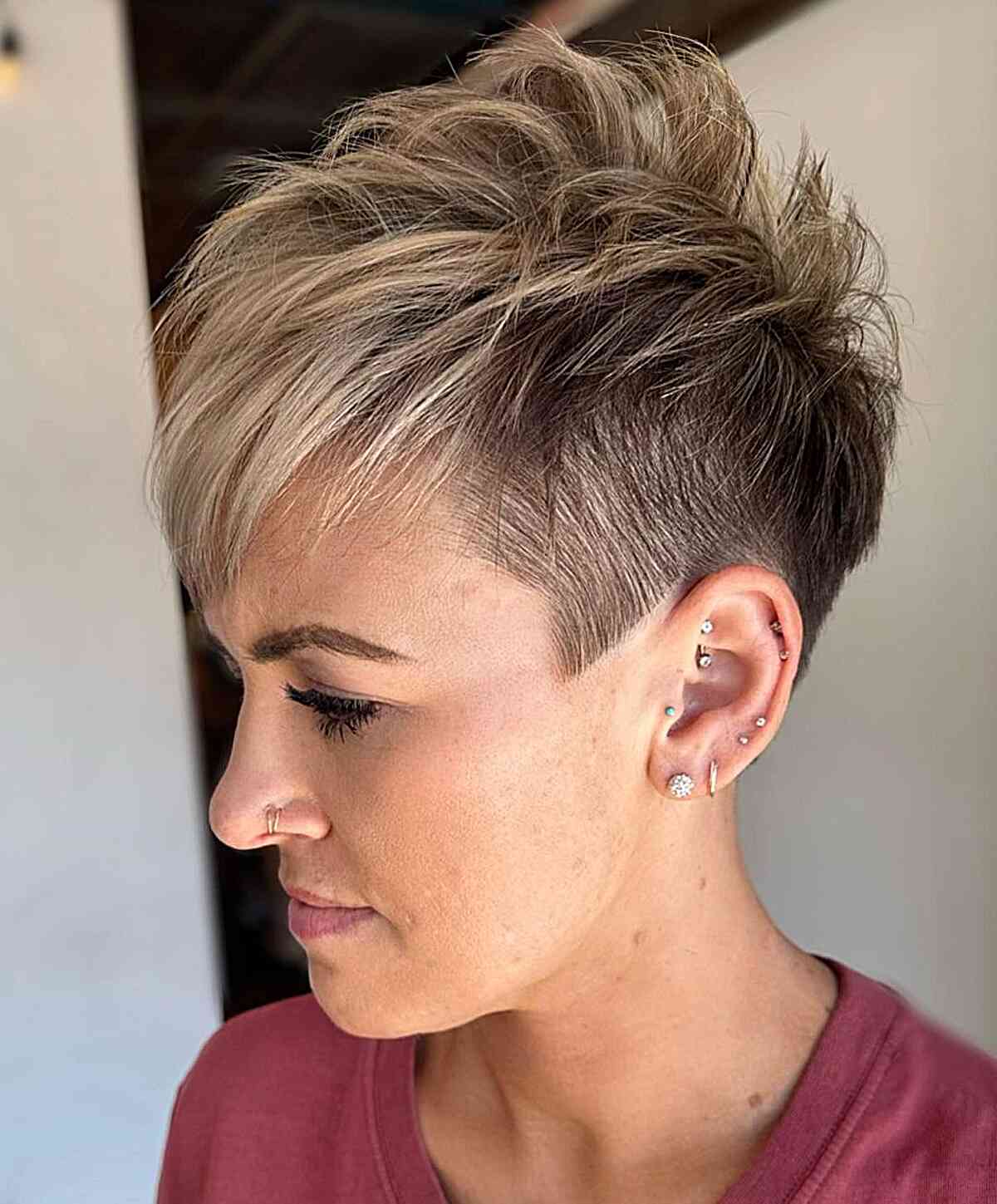 Charming Pixie Cut Featuring a Shaved Side for Fine Hair