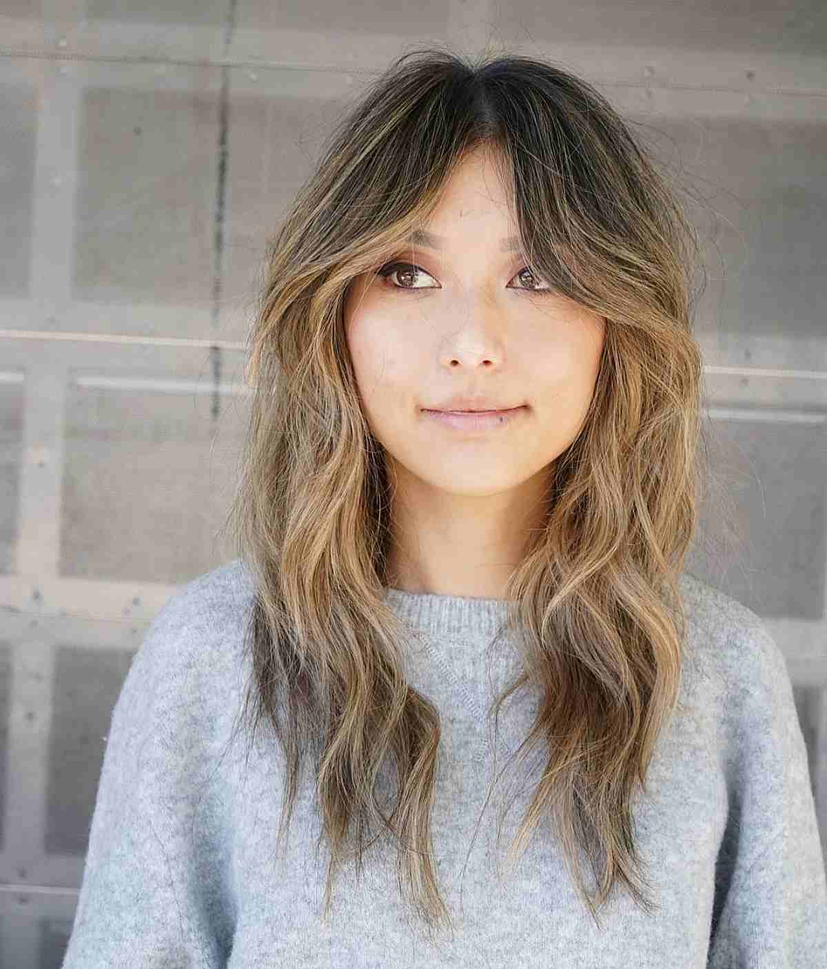 Charming Medium-Length Razored Layers with Beach Waves