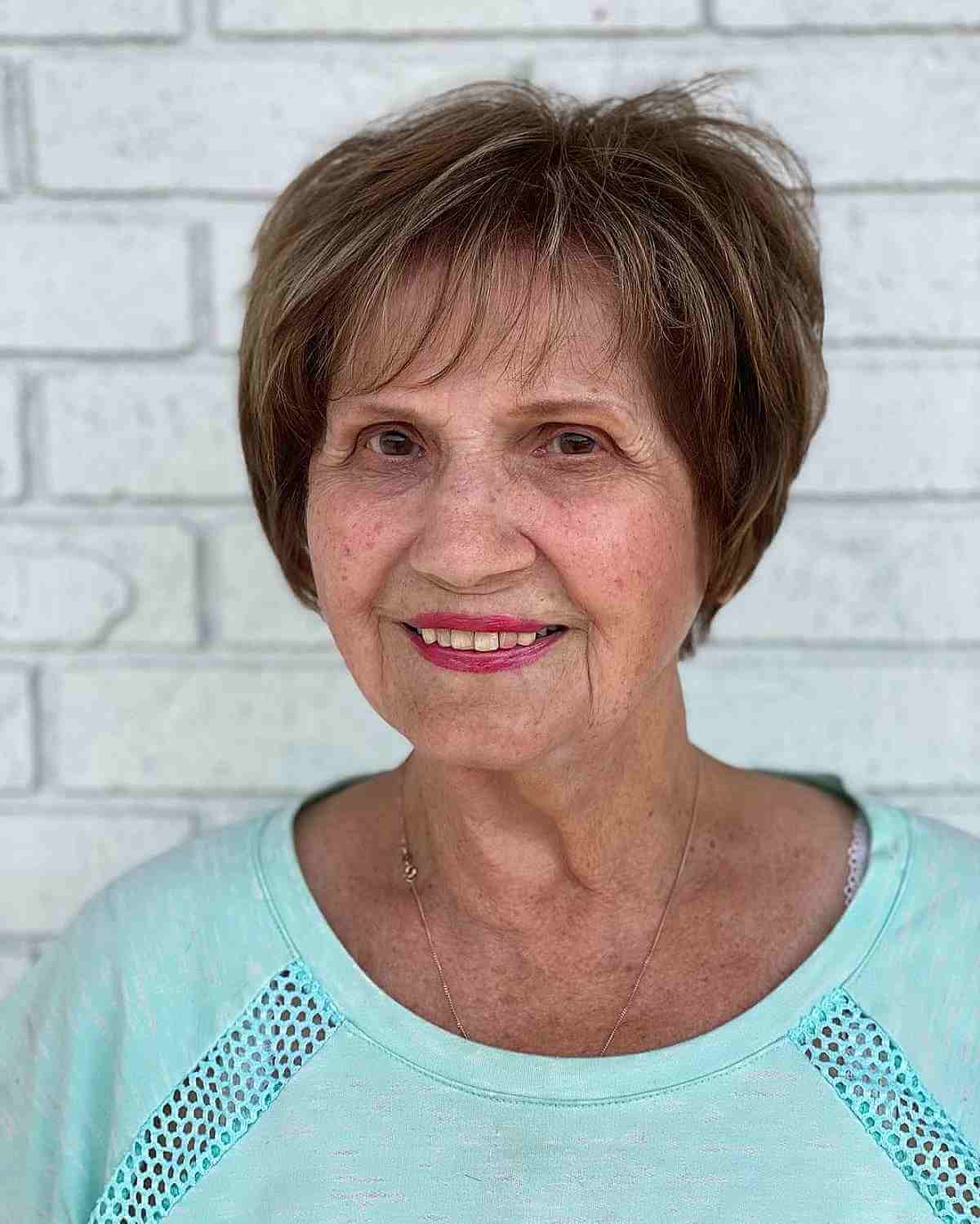 Charming Short Bob with Feathered Bangs for Ladies Over Seventy