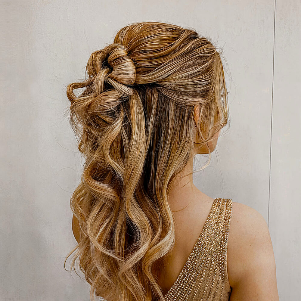 Medium-Length Wavy Hair in a Charming Half-Up Romantic Style for Prom