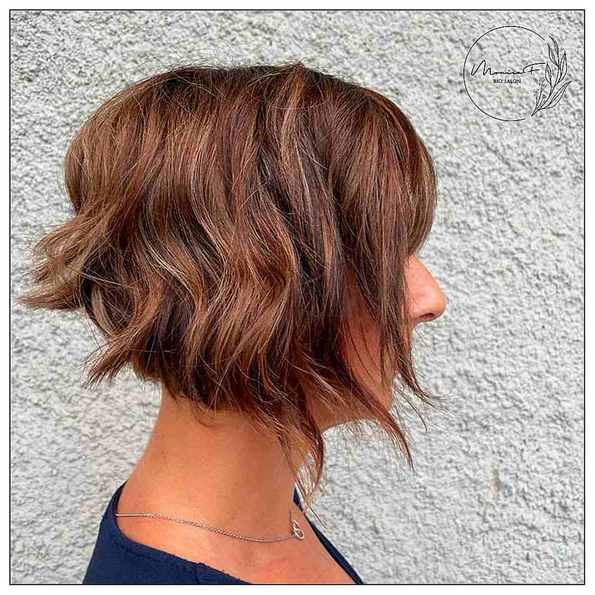 Short Chin-Length Angled Bob Haircut with Subtle Waves
