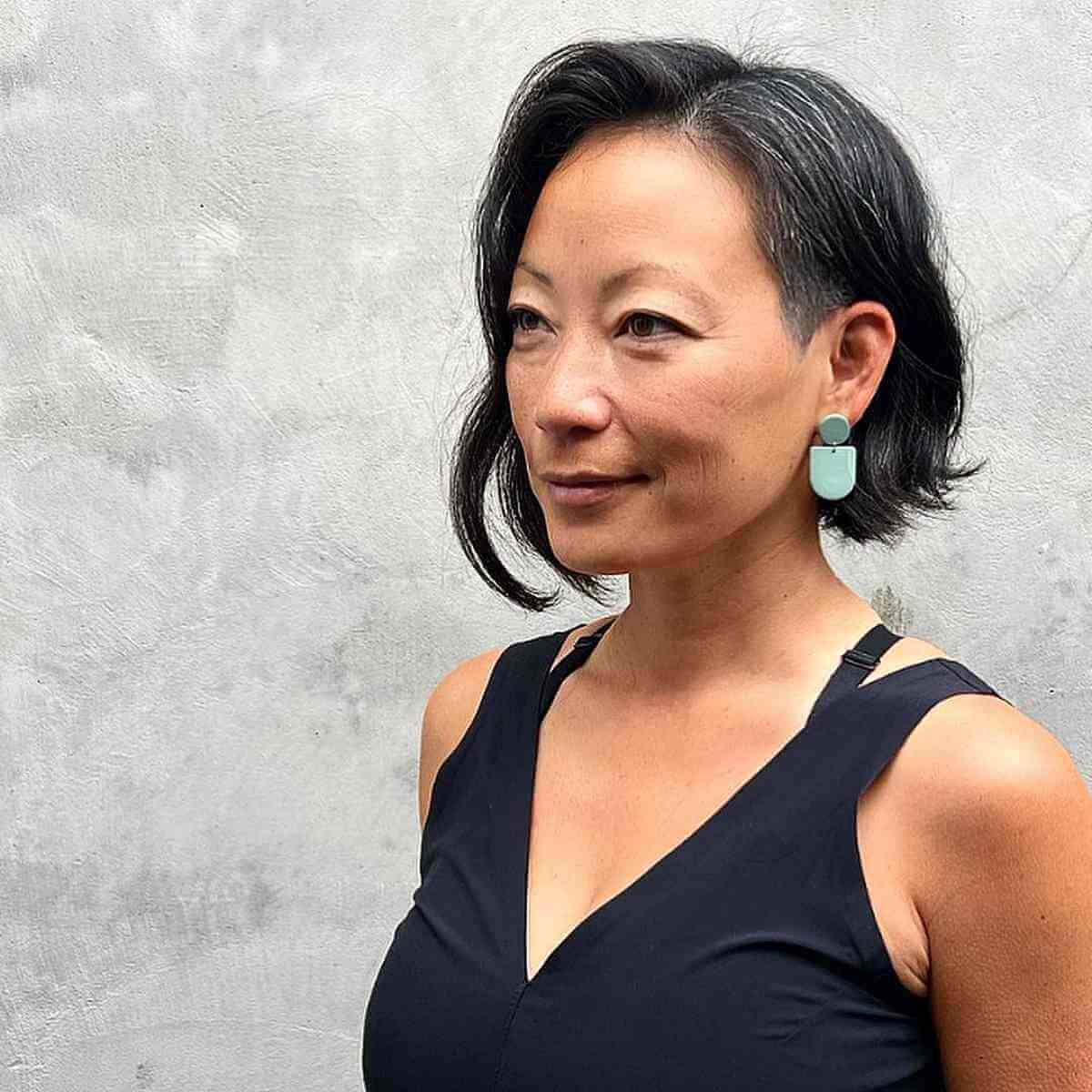Chic Asymmetrical Bob with Gentle Waves for forty-year-olds