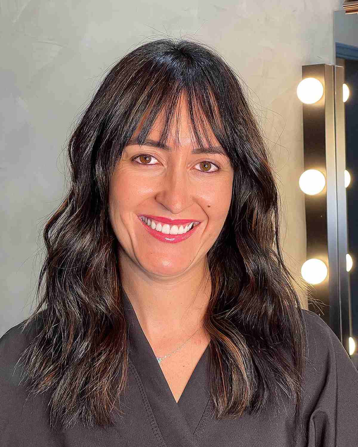 Trendy Mid-Length Bangs Hairstyles for Oval Face Shapes