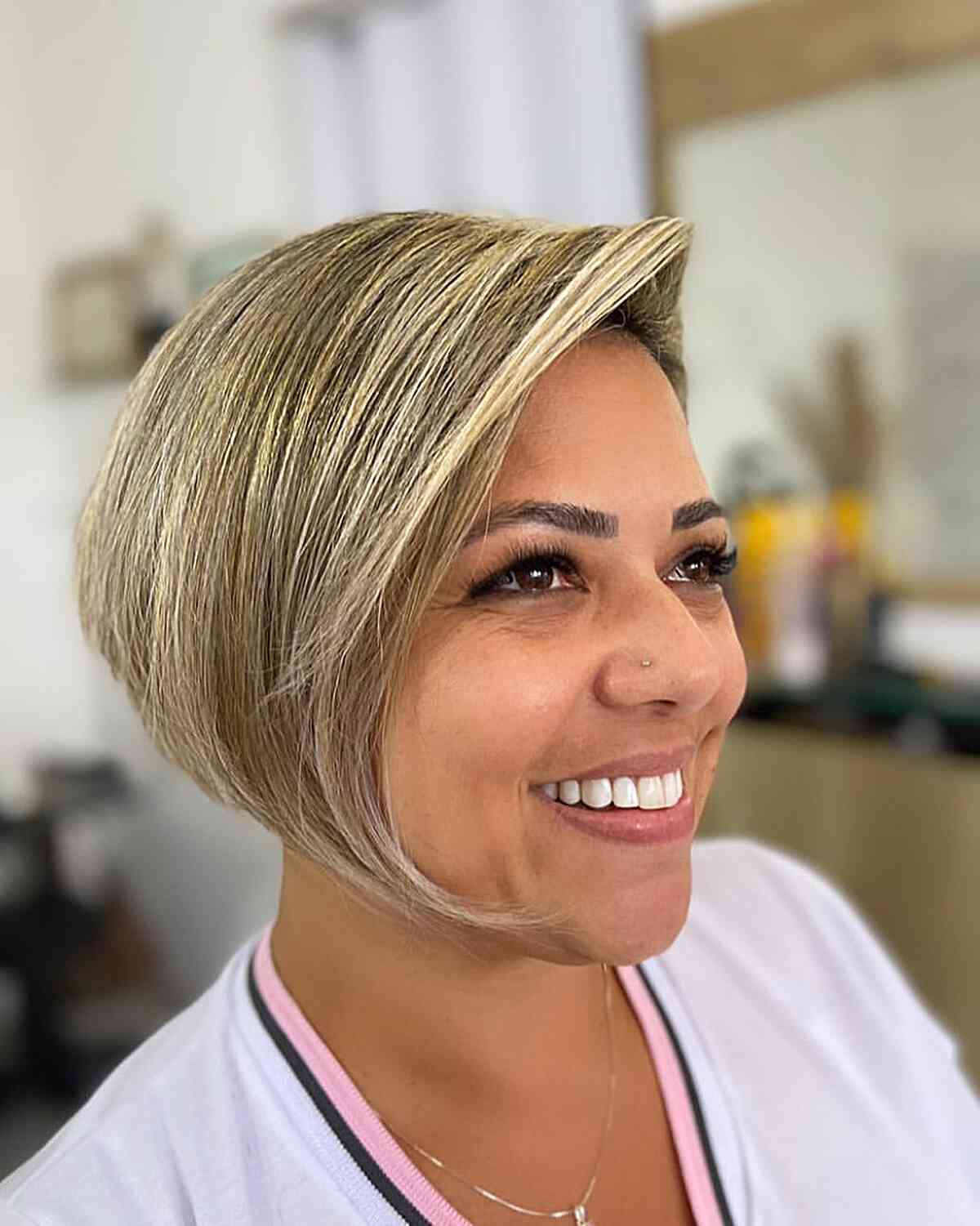 Chic Blonde Asymmetrical Bob Cut for Round Face Shapes