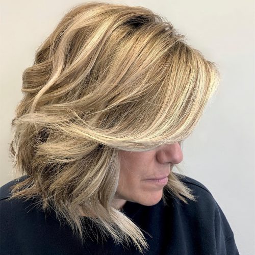 Chic long blonde bob with bangs