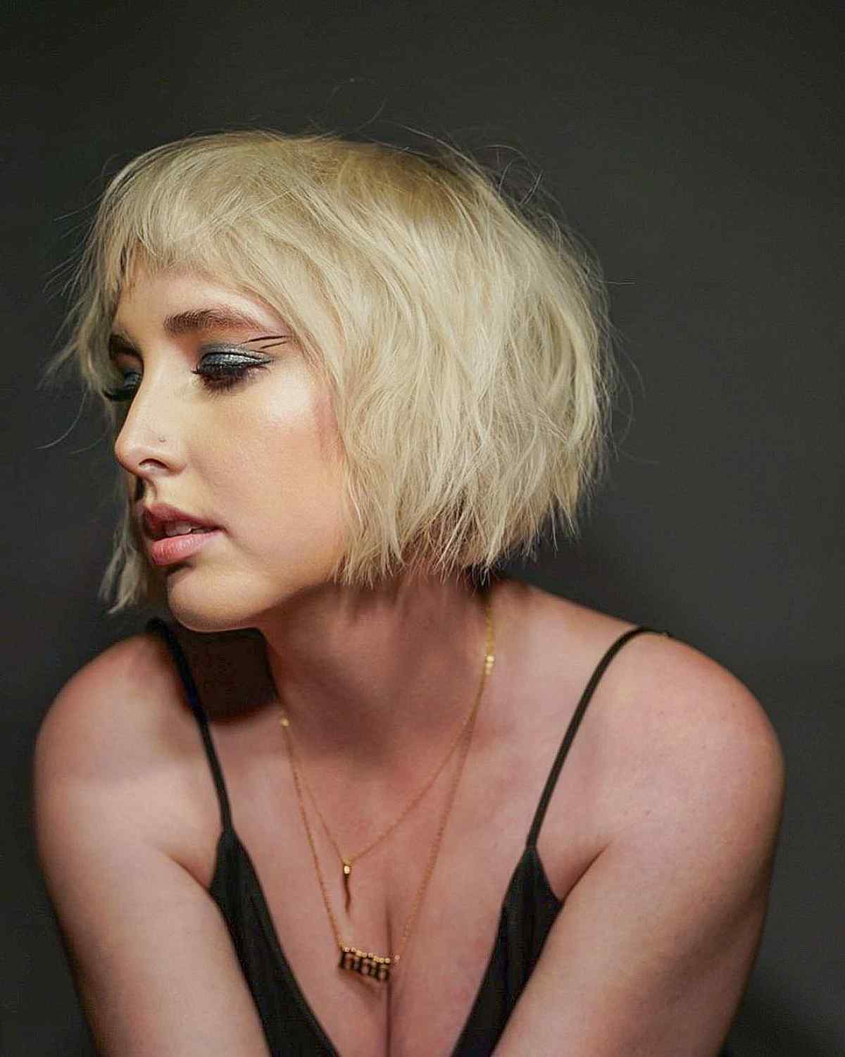 Jaw-Length Choppy Bob with Bangs Chic Blonde Hair