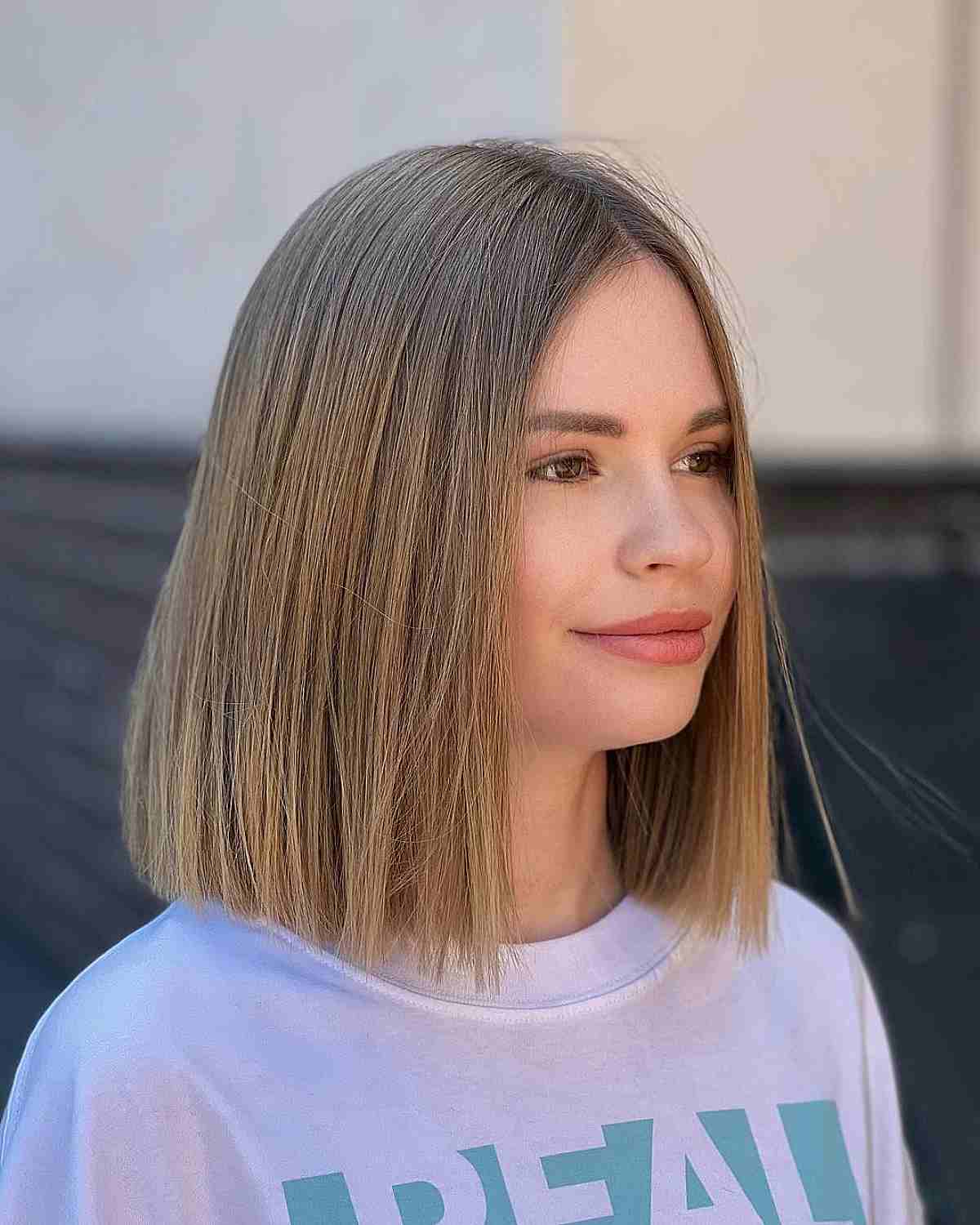 Chic Blunt Long Bob Featuring a Center Part for Fine Hair