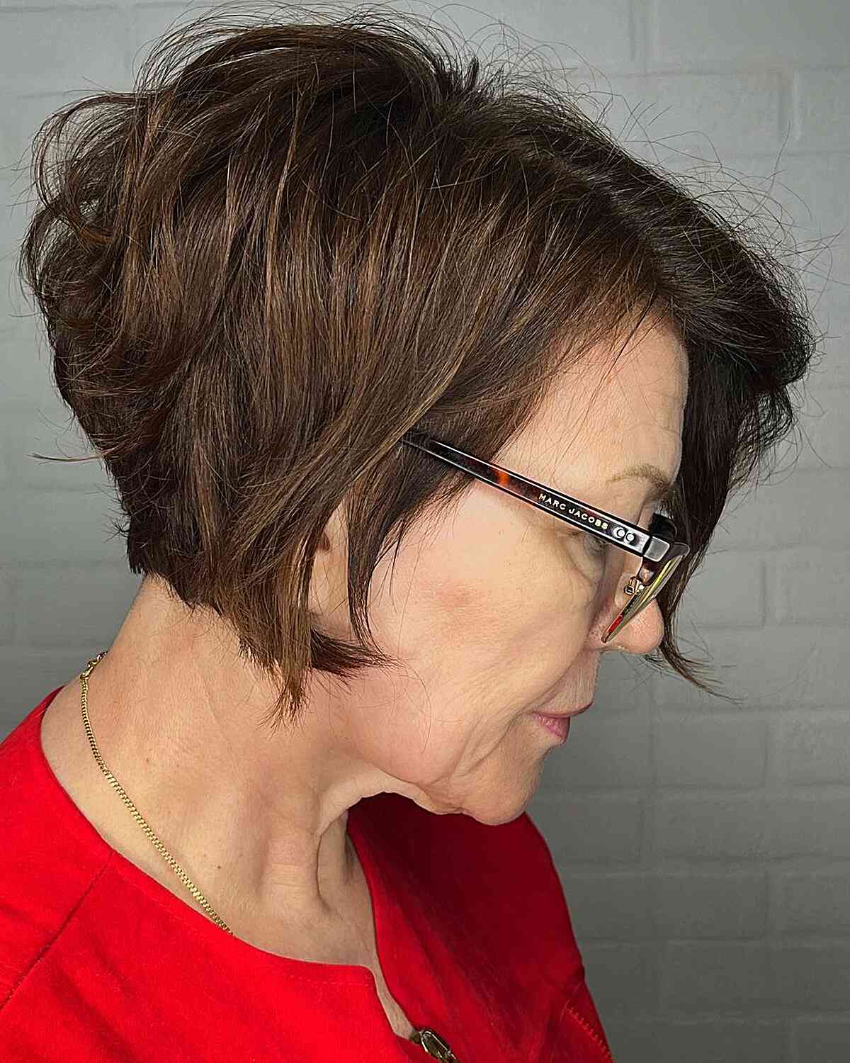 Chic Brunette Bixie for Women Wearing Glasses Aged 50
