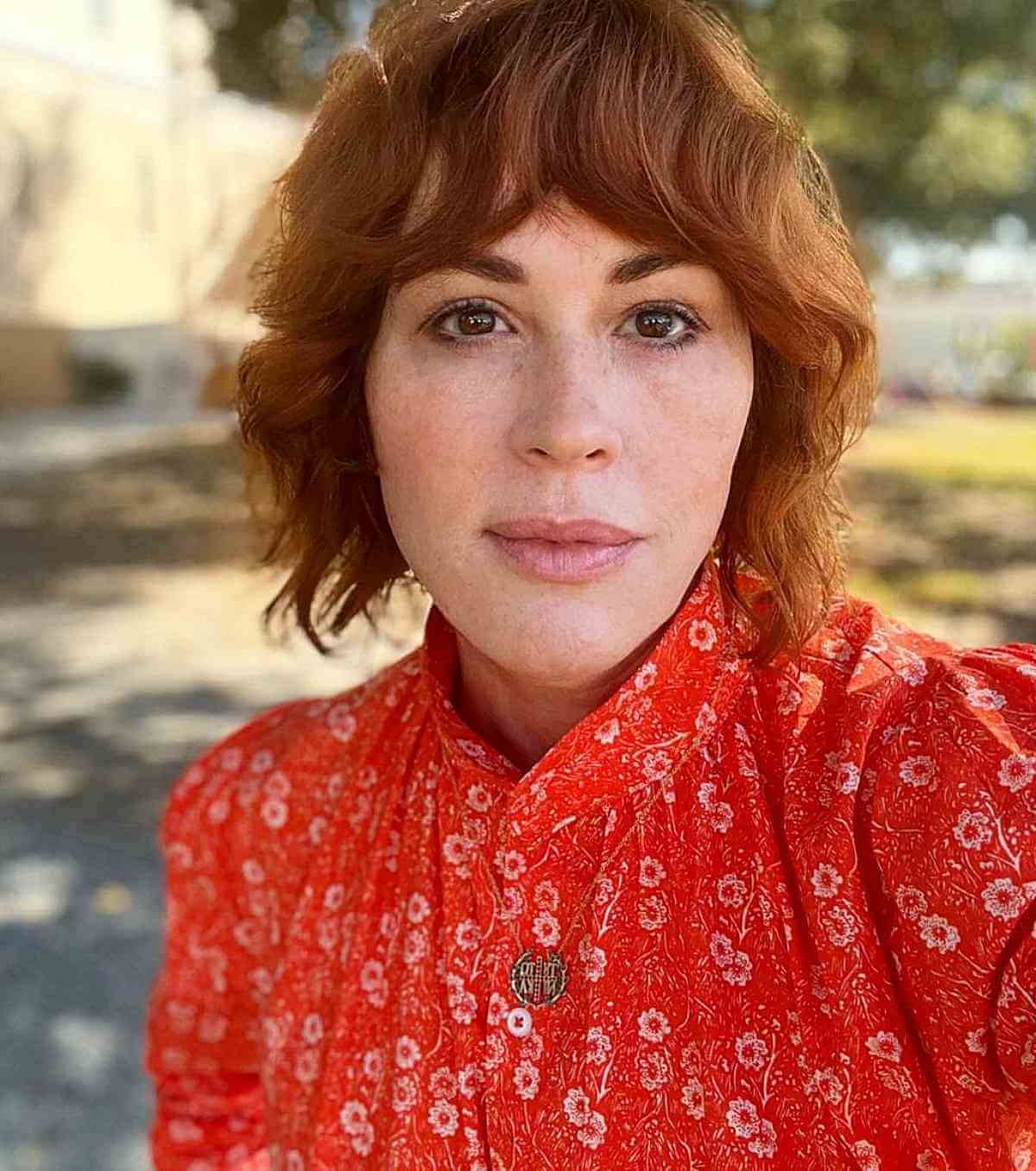 Chic Copper Shaggy French Bob with Bangs