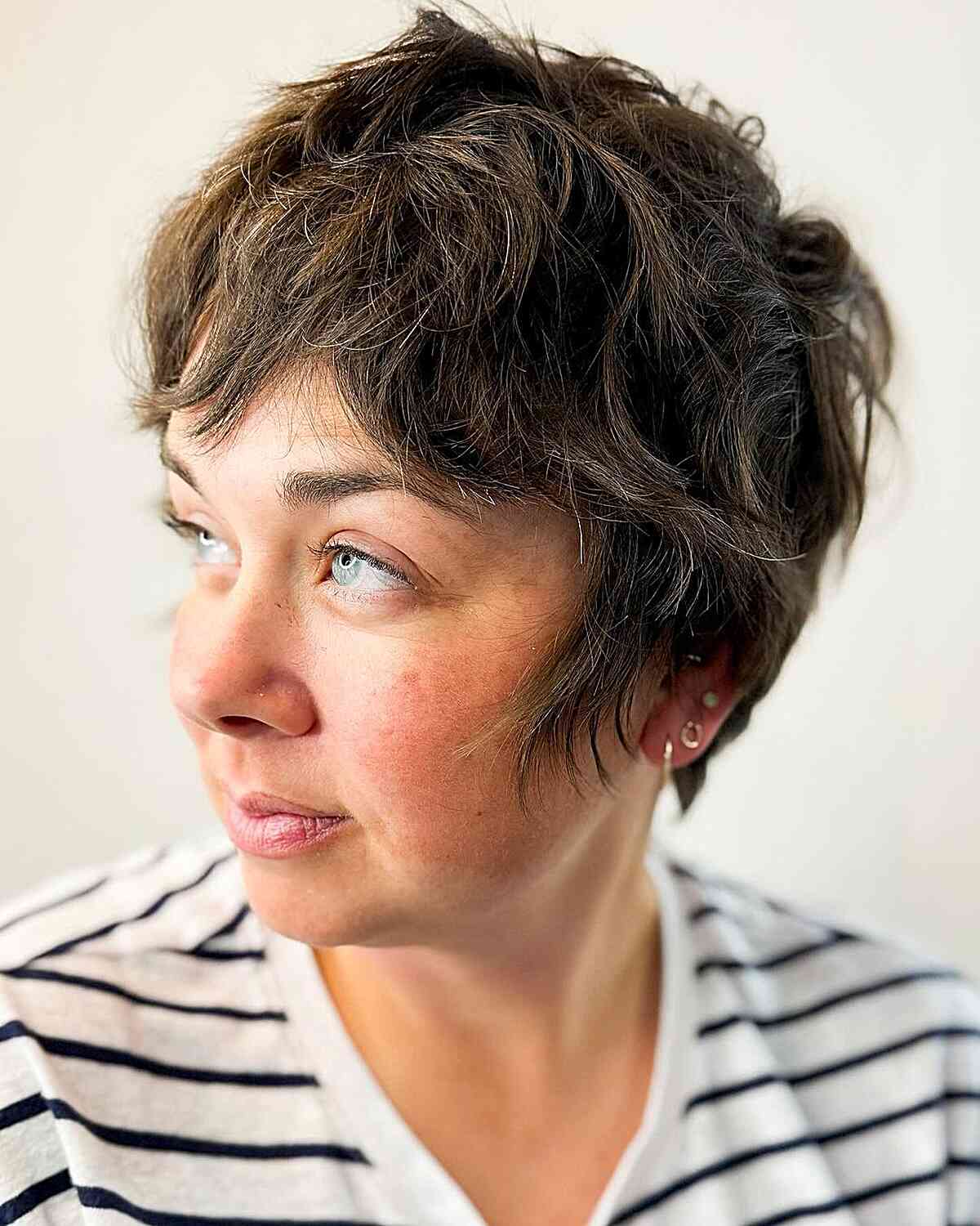 Chic Cropped Long Pixie with Shaggy Layers and Bangs