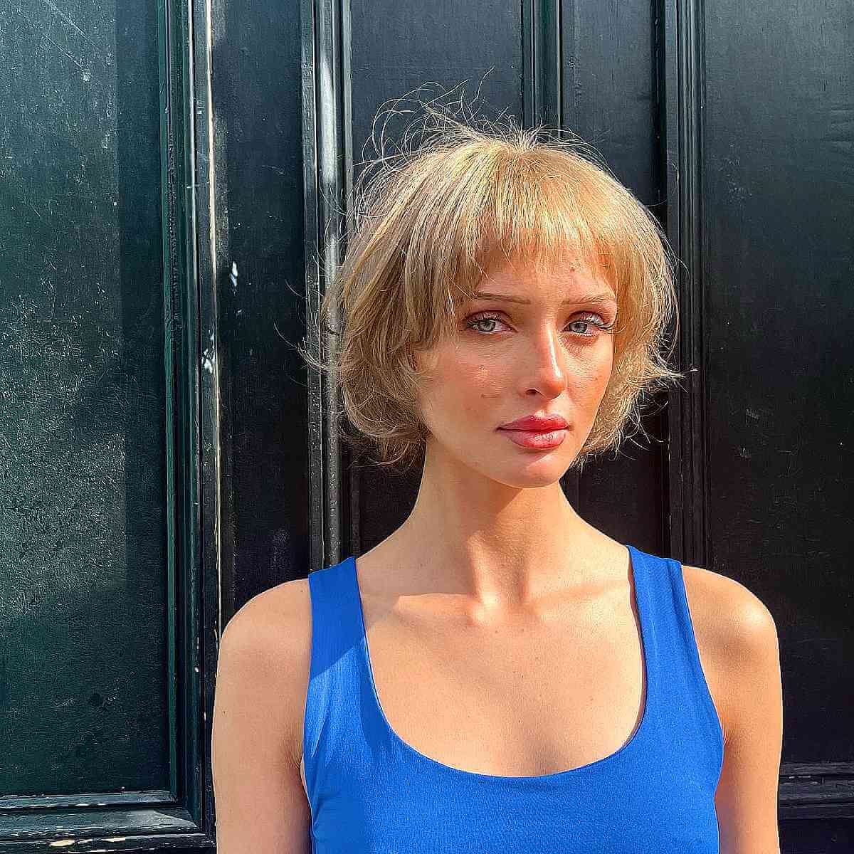 Chic Short Feathered Layers and Micro Bangs for Fine Hair