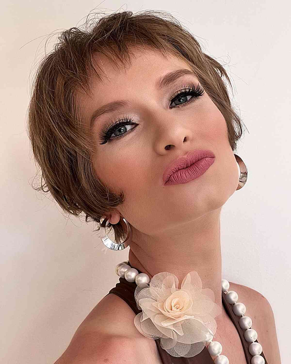 Ear-Length Chic French-Inspired Bixie Cut for women with square jawlines