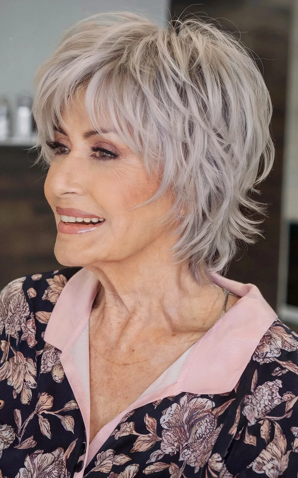 Trendy Grey Pixie Hair with Soft Feathery Layers for Women Over Seventy