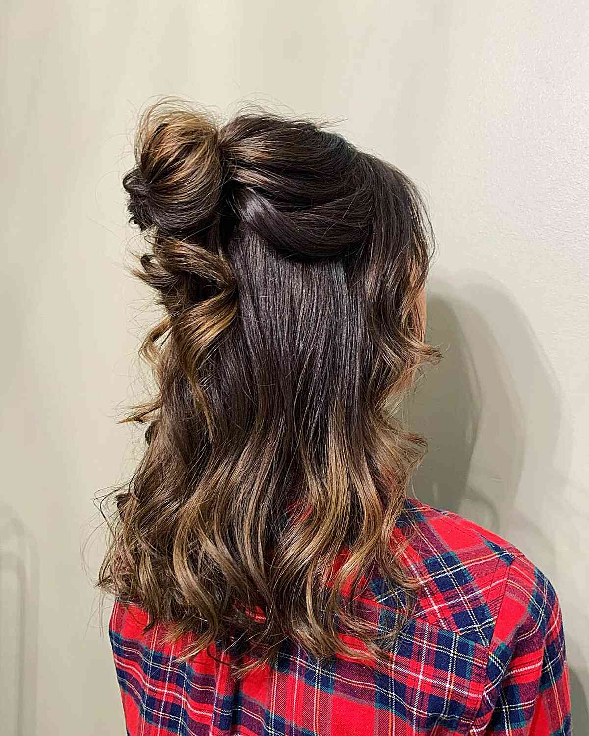 Chic high messy bun for shoulder length hair