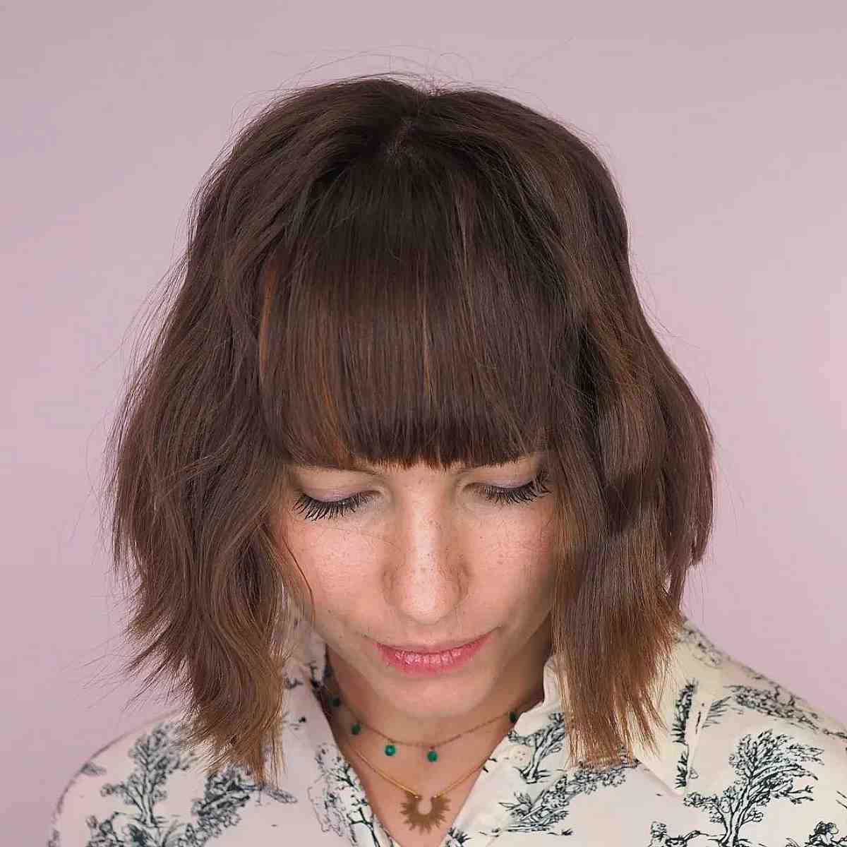 Chic Inverted Bob with Textured Tips and Bangs
