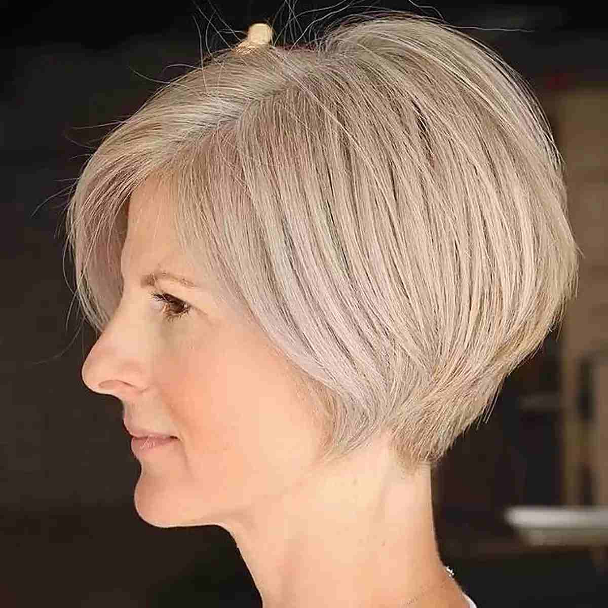 Stylish Jaw-Length Bixie Cut with Layers for women showcasing short blonde hair