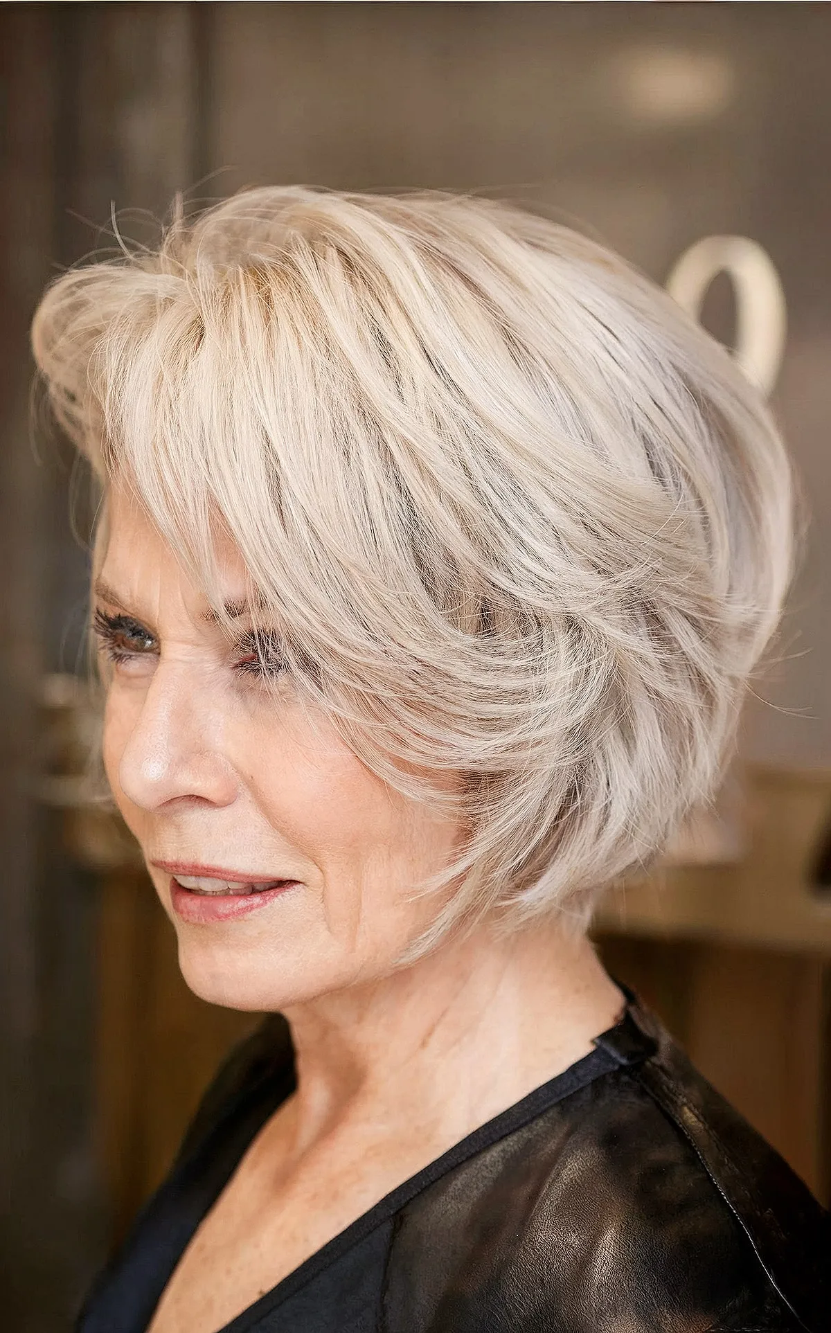 Chic Jaw-Length Feathered Bob with Bangs for Mature Women