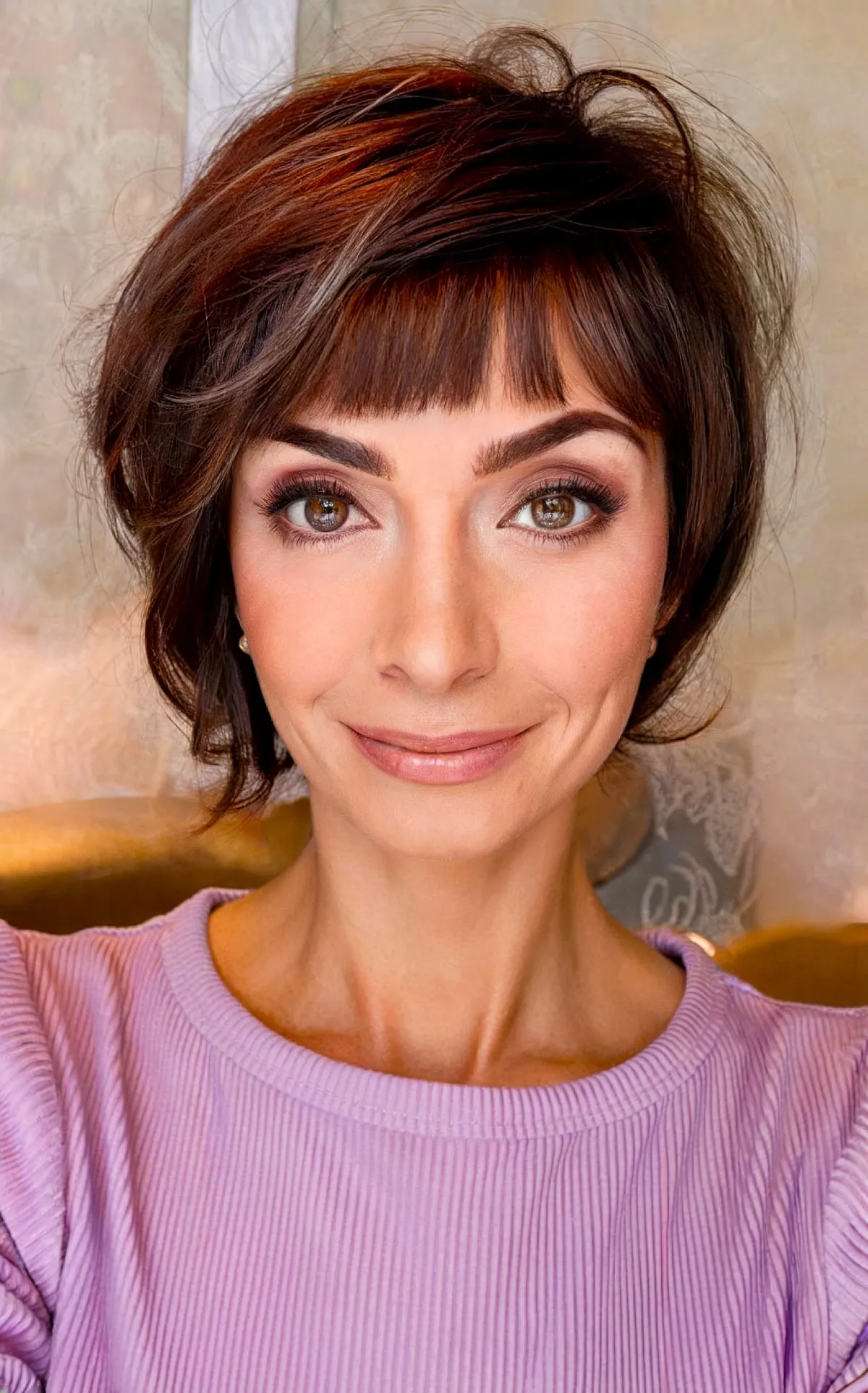 Chic Layered Bob with Straight Bangs for Women in Their 40s