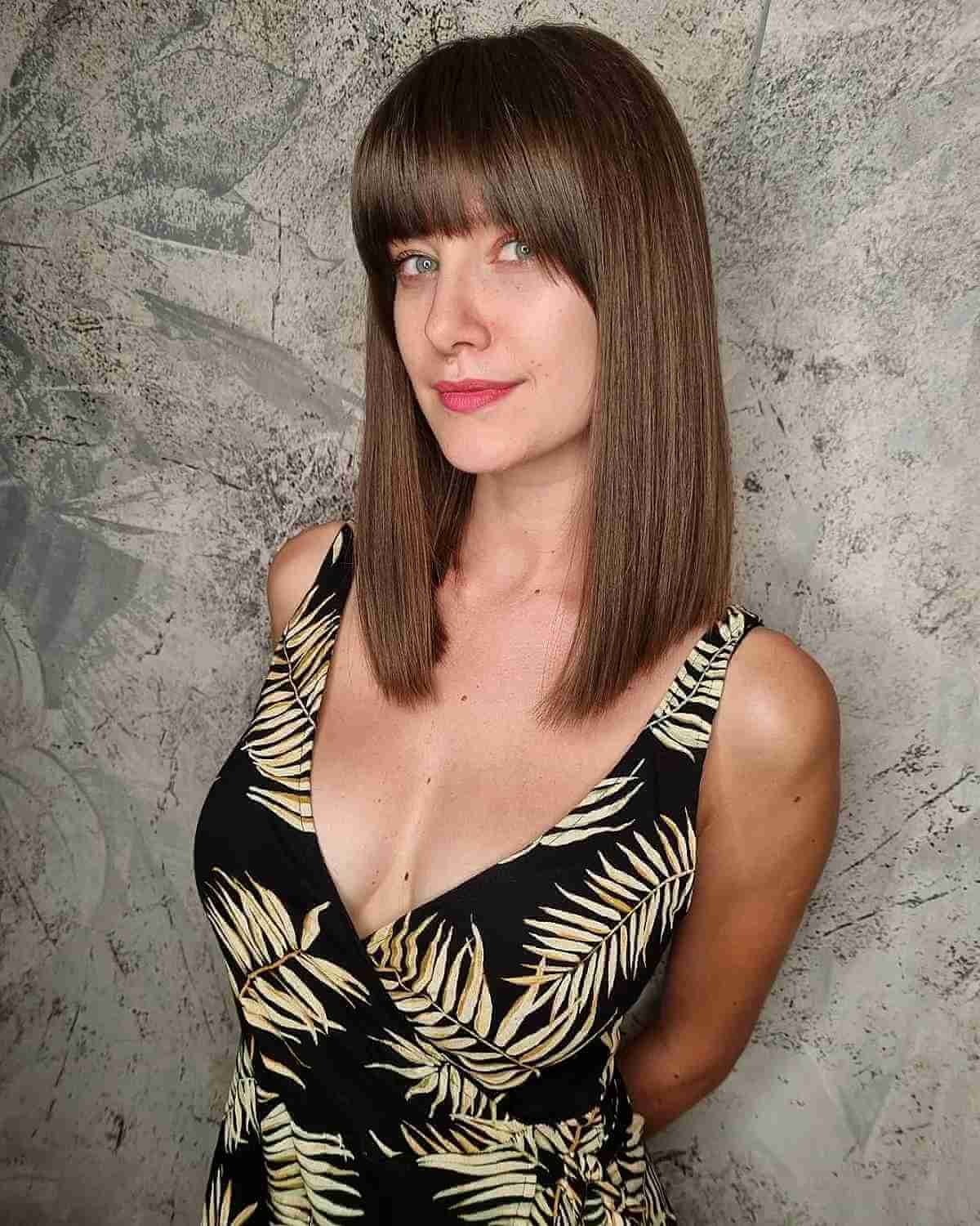 Chic Long Bob Hairstyle with Straight-Across Bangs