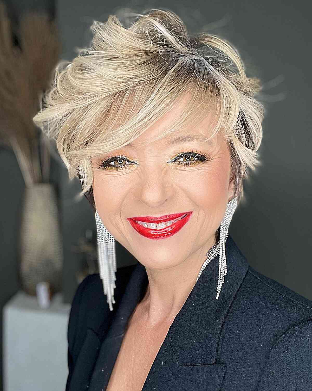 Chic Long Pixie with Flattering Bangs for Women Aged 50 with Thin Hair