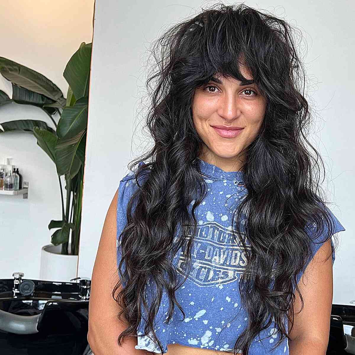 Chic Long Wispy Shag with Bold Bangs