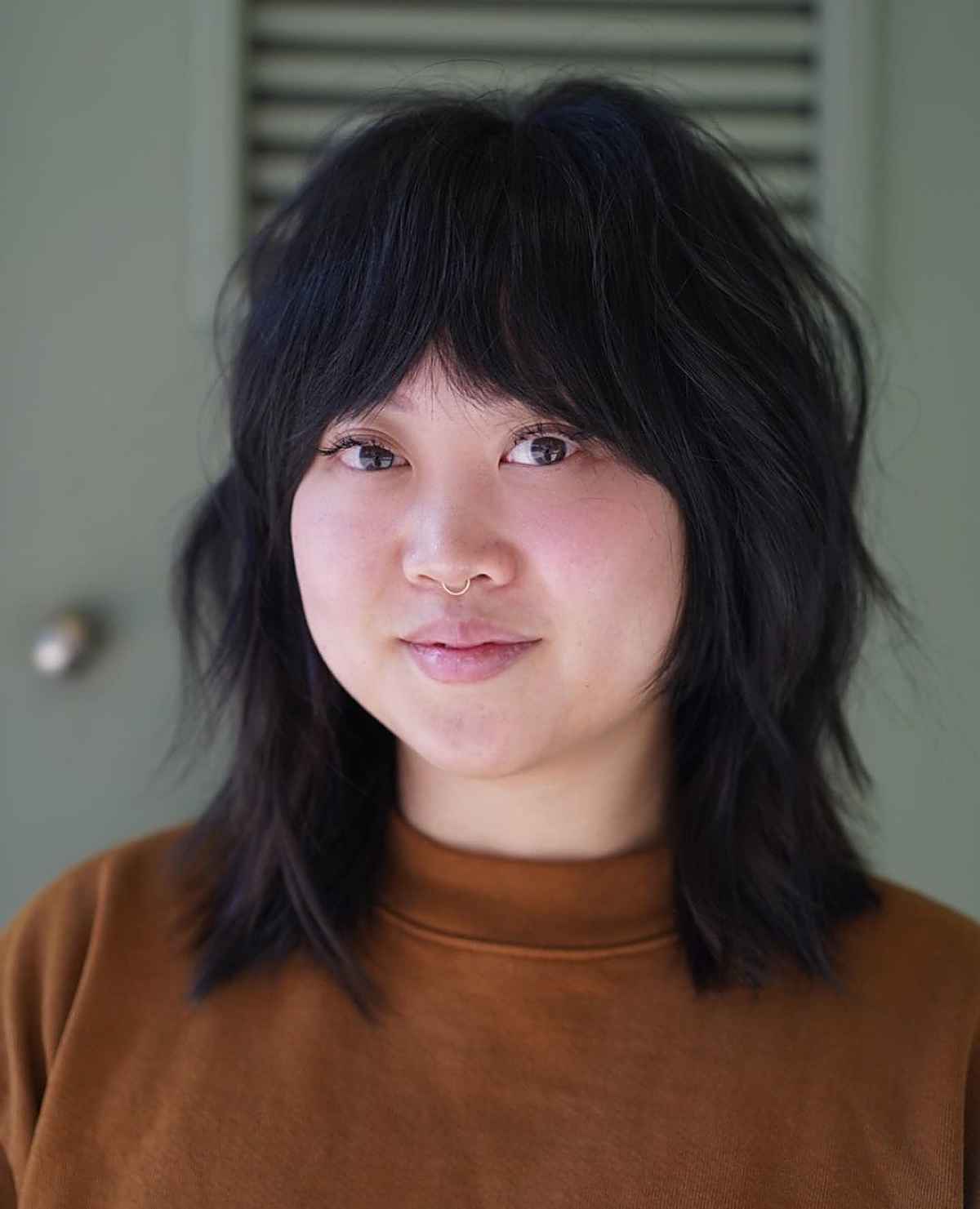 Chic Long Shaggy Bob with Full Fringe