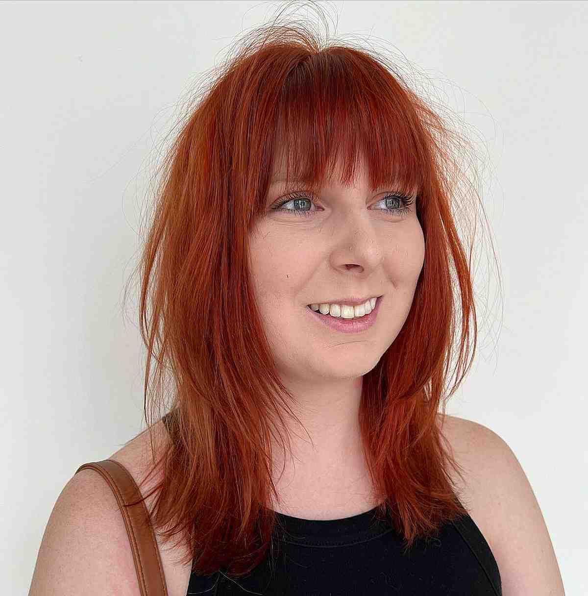 Chic Messy Layered Cut with Bangs for Fine Straight Hair