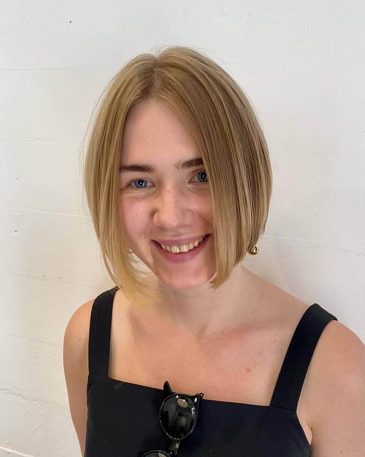 Trendy Low-Maintenance Middle Part Chin-Length Bob for Fine Hair