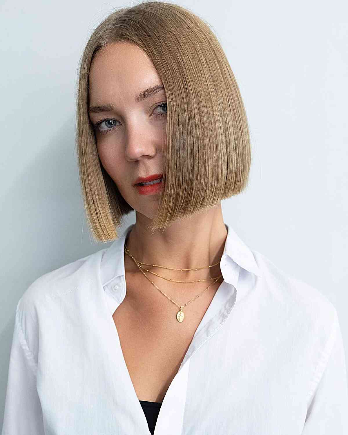 Short Chin-Length Sleek Blonde One-Length Bob for Fine Hair
