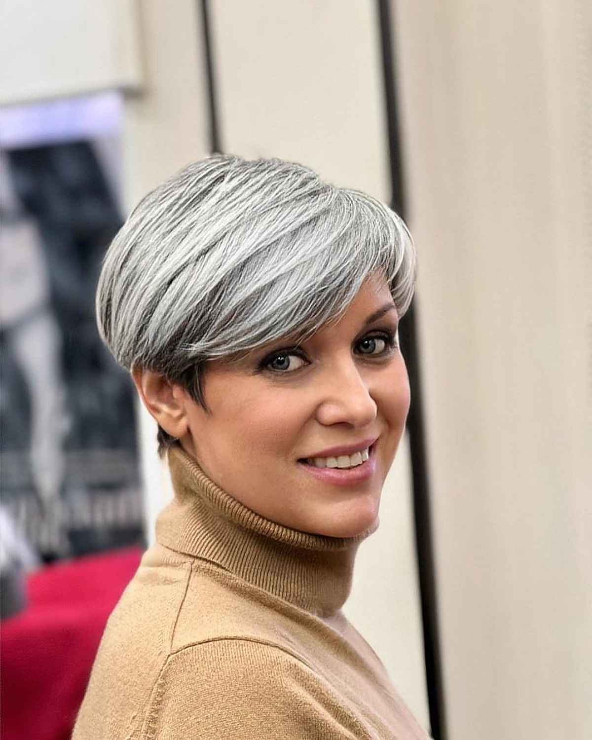 Chic Pixie Cut featuring Fringe and a Bold Side Part