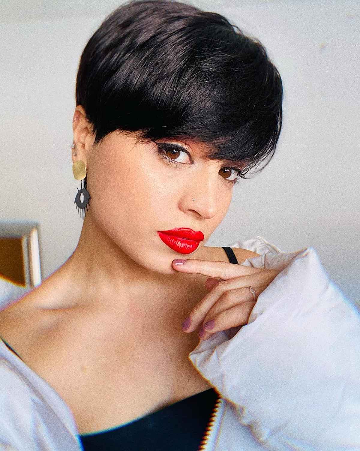 Chic Pixie Cut with Bold Bangs for Thick Hair