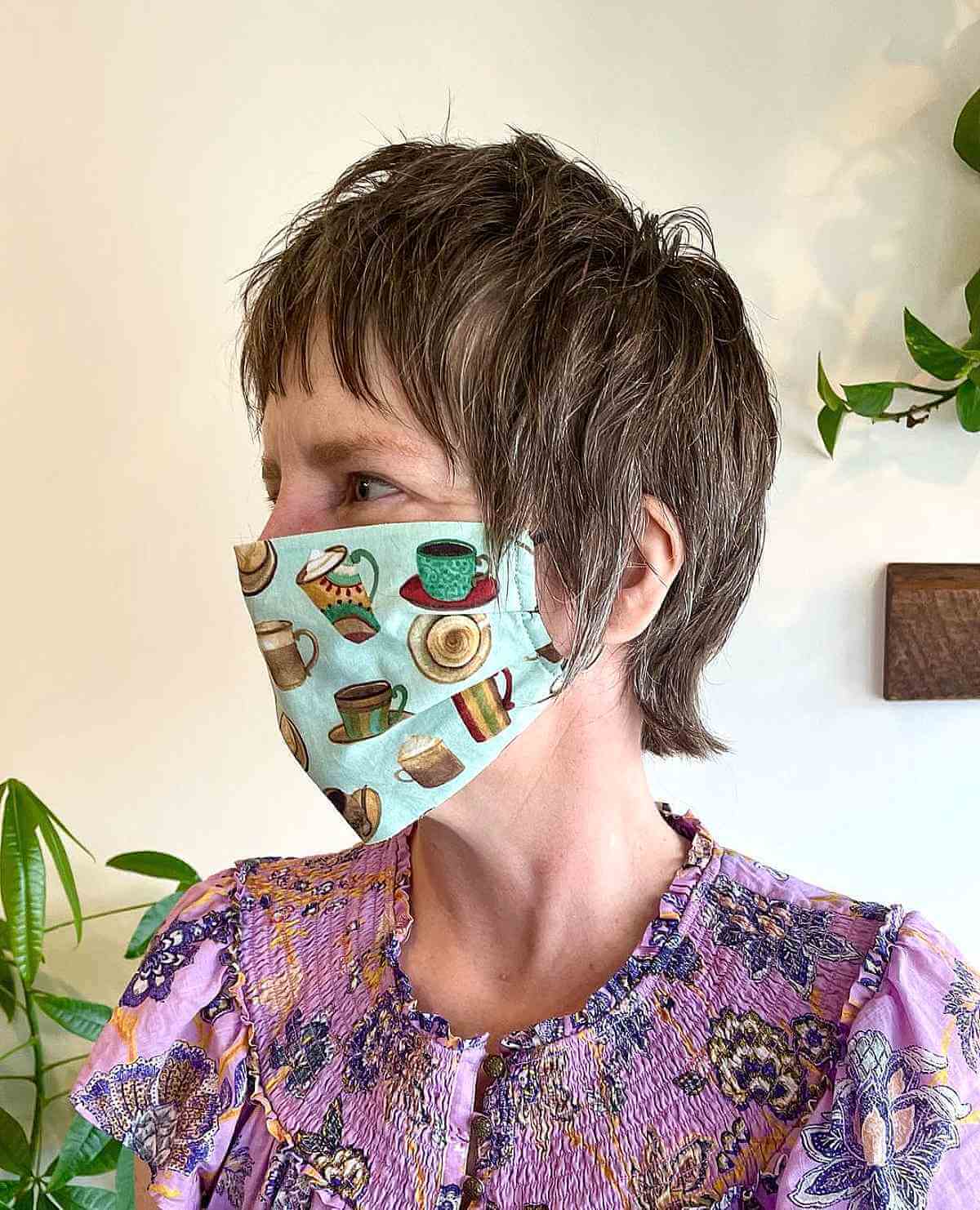 Chic Pixie Mullet with Feathery Bangs for Older Women