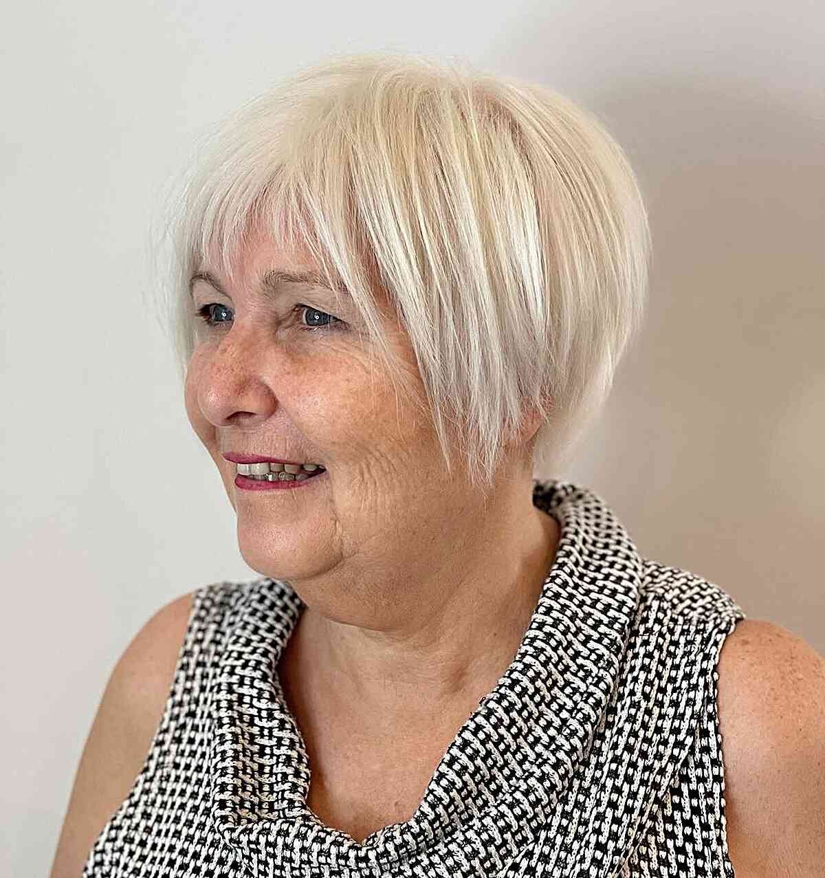 Chic Platinum Long Pixie with Edgy Bangs for Women Over 70