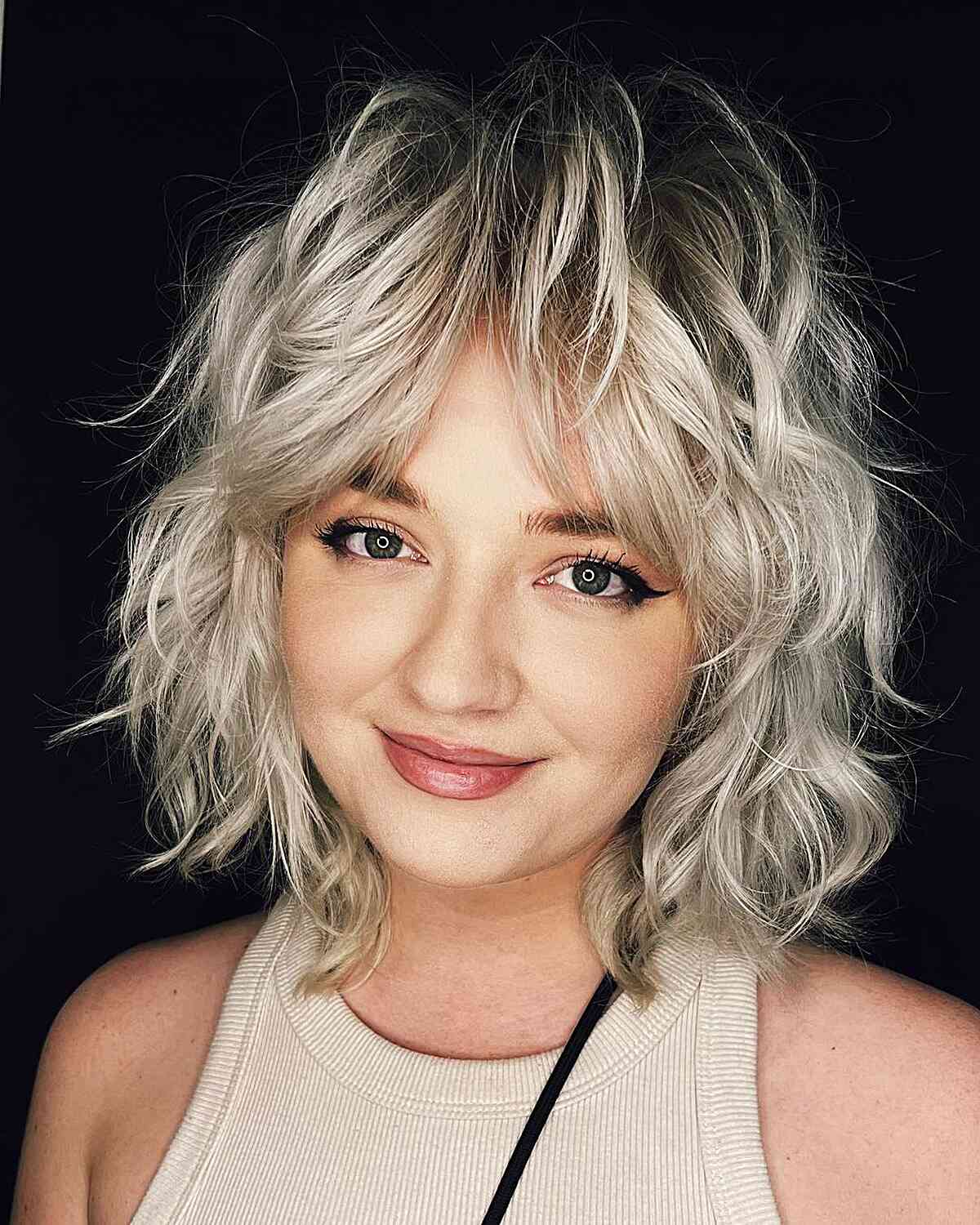 Chic Platinum Messy Shaggy Bob Cut with Curtain Bangs