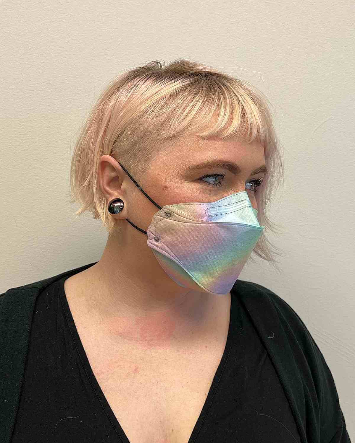 Chic Razor Cut French Bob Featuring a Shaved Side