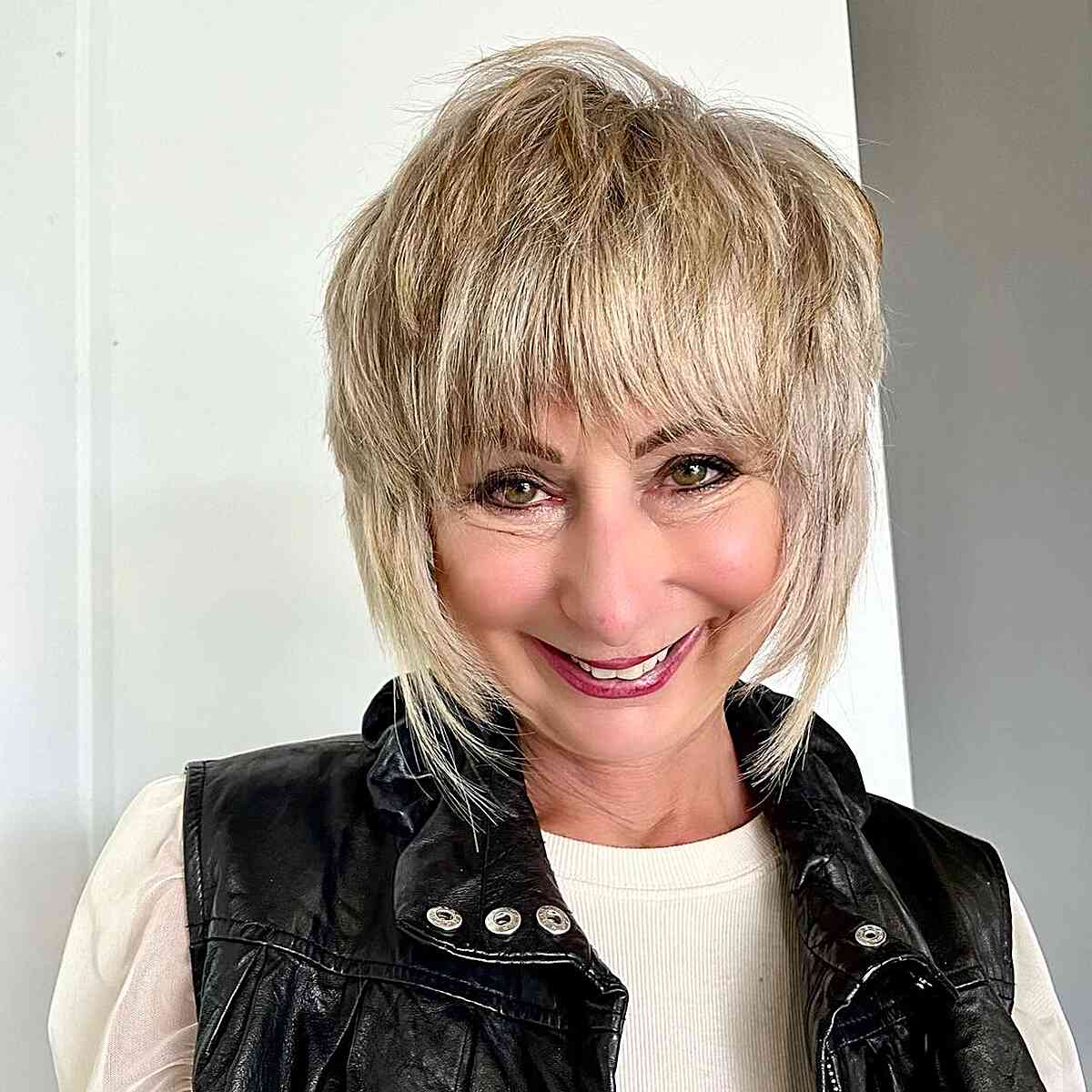 Trendy Short Blonde Shag Haircuts with Bangs for Women Above 50