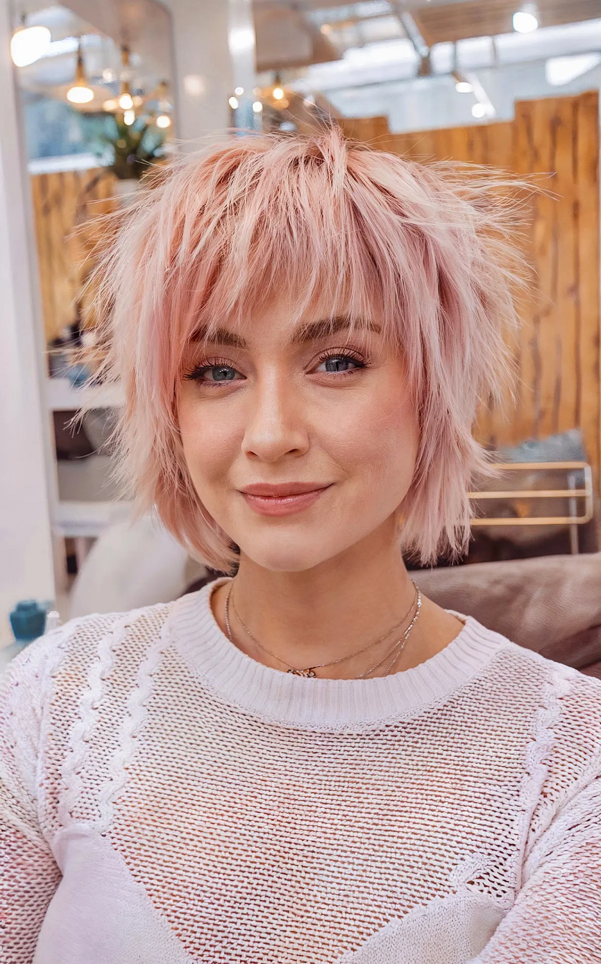 Chic Shagged Razor Cut Bob with Sleek Fringe for Short Pink Hair